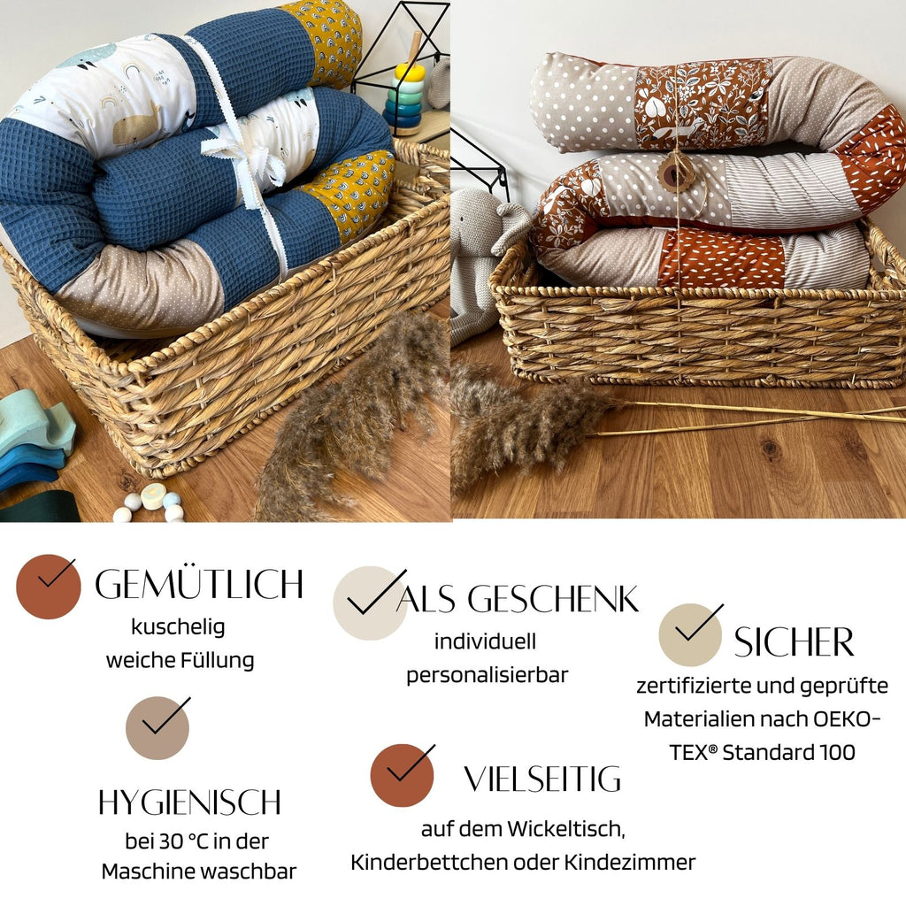 a basket filled with blankets sitting on top of a wooden floor